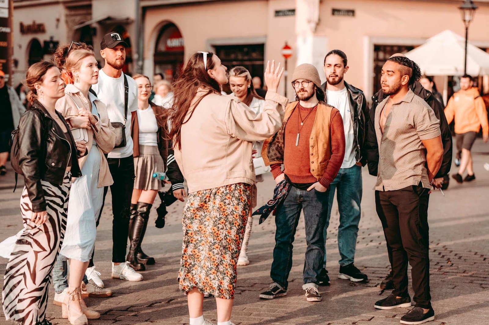 Local guide speaking to a small food tour group